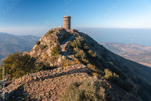 13th Century Tour de Madeloc rises above the Mediterranean coast in the Cote Vermeille region of southern France photo