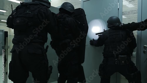 Special forces in black uniforms.
