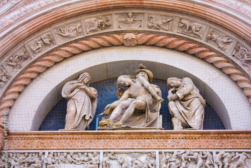 Rich decoration of Bologna Cathedral (Basilica di San Petronio) on Piazza Maggiore, Italy photo