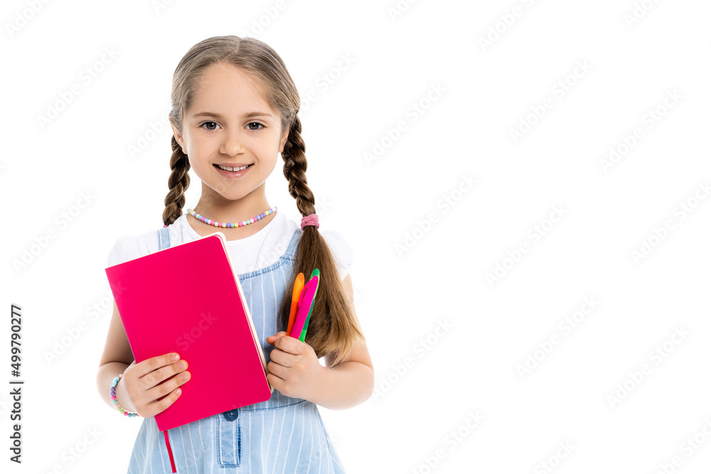 cheerful girl with colorful felt pens and copy book looking at camera isolated on white. cheerful girl with colorful felt pens and copy book looking at camera isolated on white.