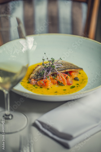 Sea bass Fish, Lavrak on White Plate, Tasting, Restaurant food photo