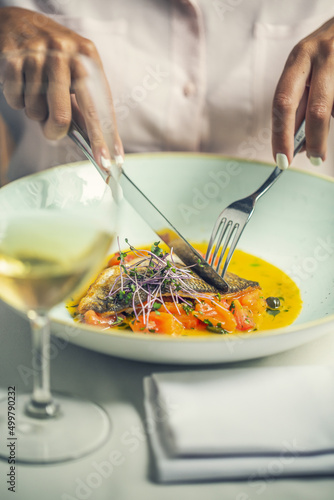 Sea bass Fish, Lavrak on White Plate, Tasting, Restaurant food photo