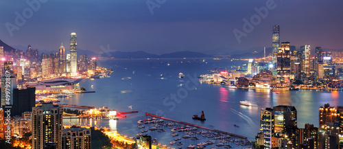 Hong Kong night view of skyline with reflections at victoria harbor