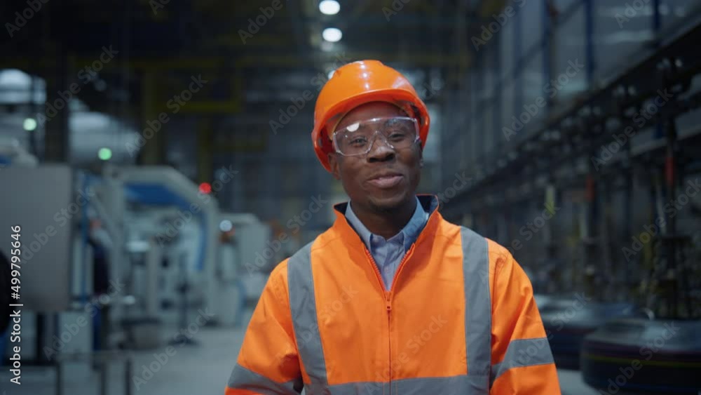 African american worker smiling at modern digital production factory portrait African american worker smiling at modern digital production factory portrait