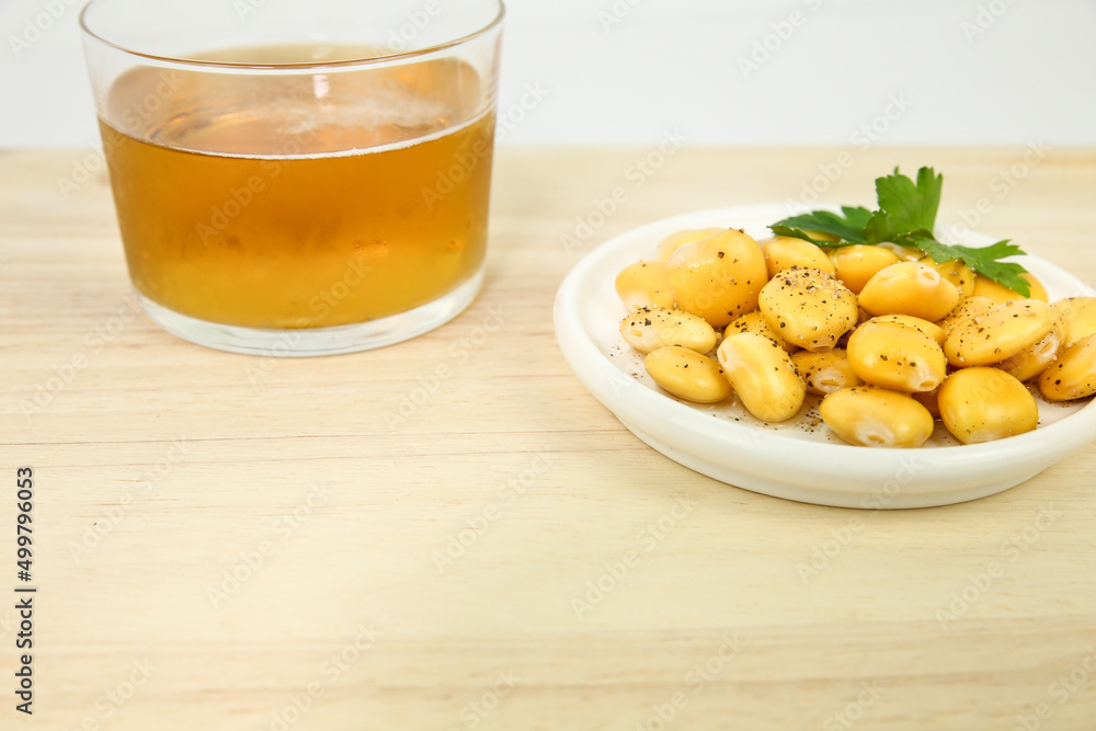 Spanish Tapa of Lupin Beans next to cold beer Spanish Tapa of Lupin Beans next to cold beer