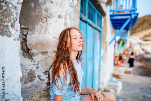 Teenage girl in Greek village © BlueOrange Studio