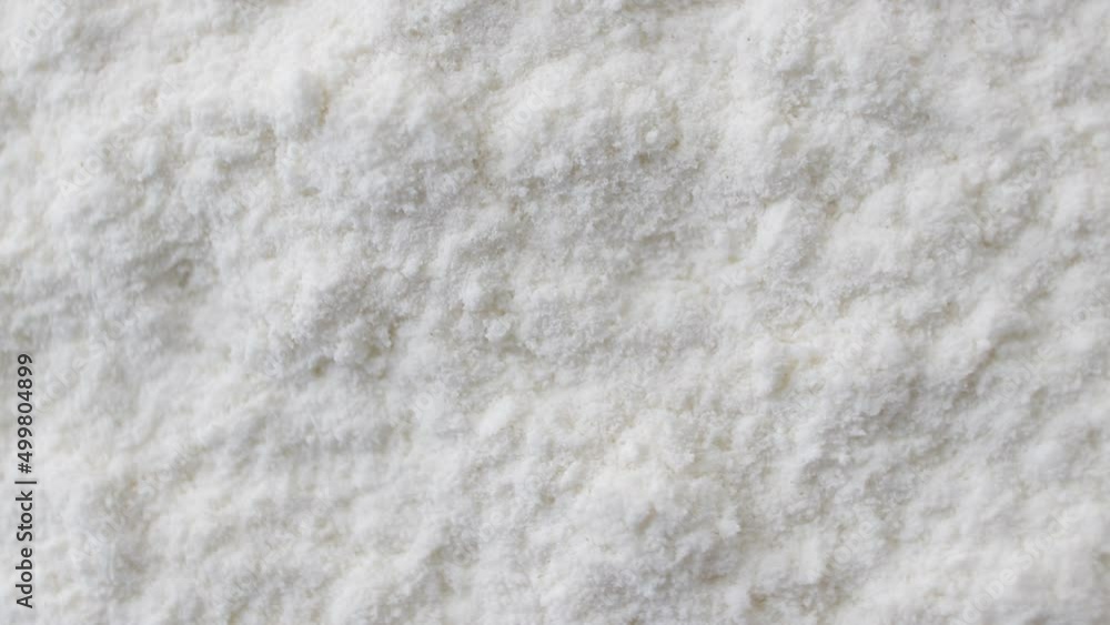 Wheat flour rotating close up, food background Wheat flour rotating close up, food background