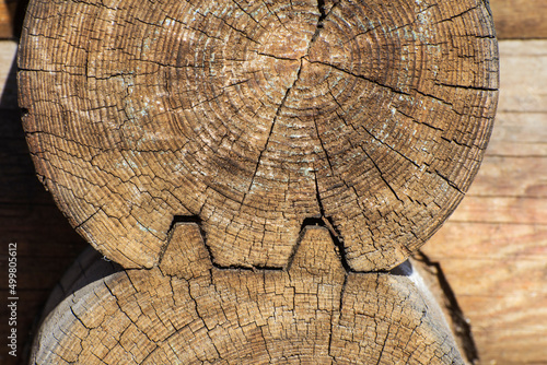 Wooden logs close up. Log house structure wood building, home exterior.