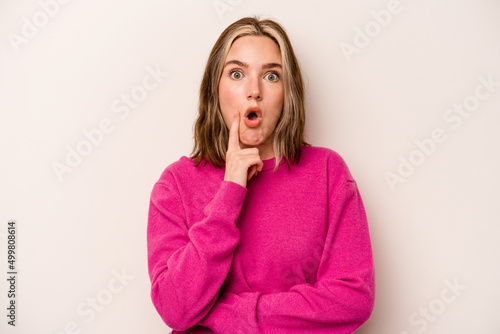 Young caucasian woman isolated on white background having some great idea, concept of creativity.
