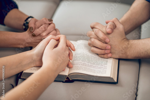 Close up picture of hands while praying