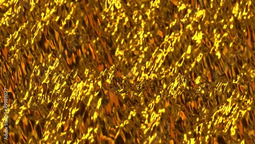Gold metallic liquid that rises violently