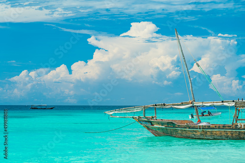 Fishing ship in water of Indian ocean. Zanzibar, Tanzania © garrykillian