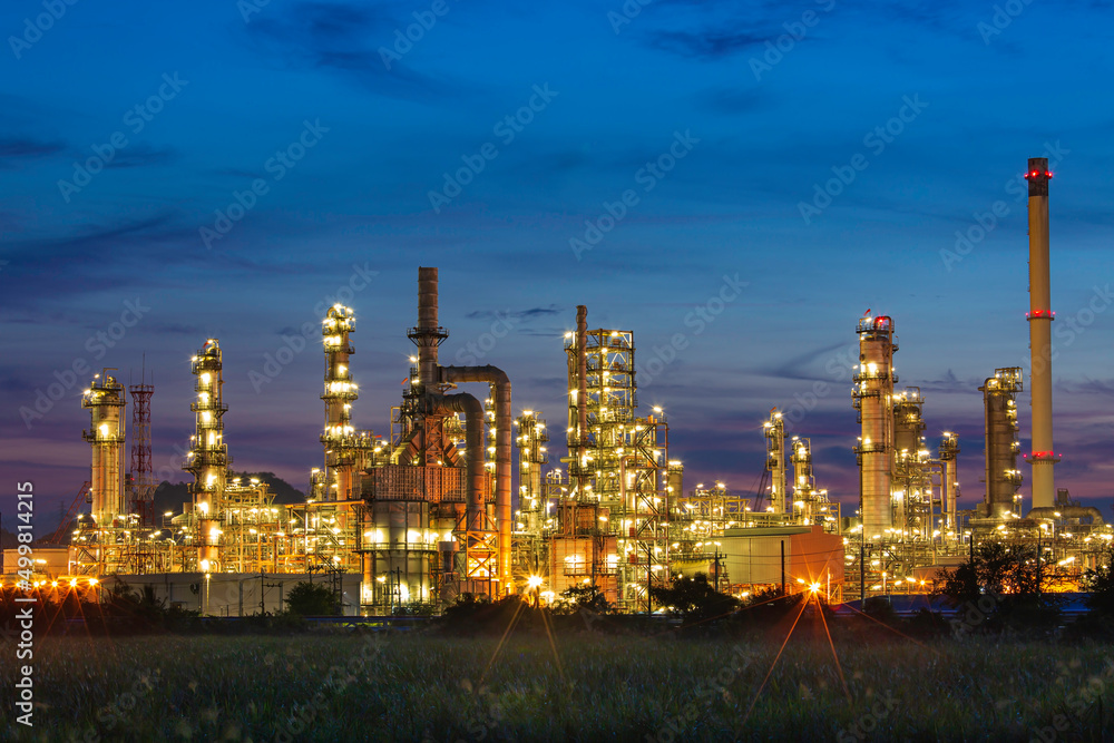 Oil​ refinery​ and​  plant and tower column of Petrochemistry industry in oil​ and​ gas​ ​industrial with​ cloud​ blue​ ​sky the morning