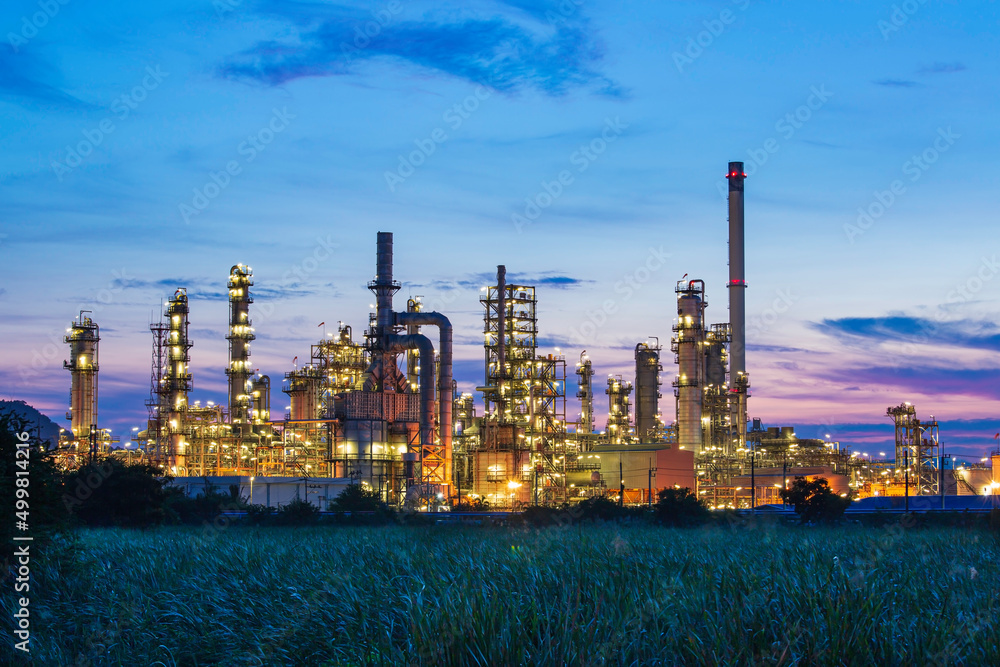 Oil​ refinery​ and​  plant and tower column of Petrochemistry industry in oil​ and​ gas​ ​industrial with​ cloud​ blue​ ​sky the morning