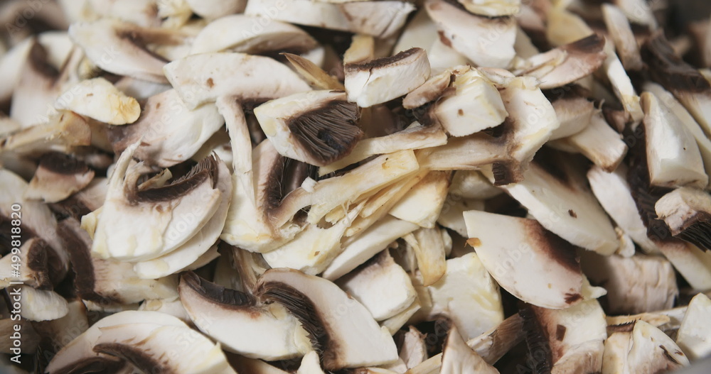 Chef Slicing Mushrooms in Kitchen Chef Slicing Mushrooms in Kitchen