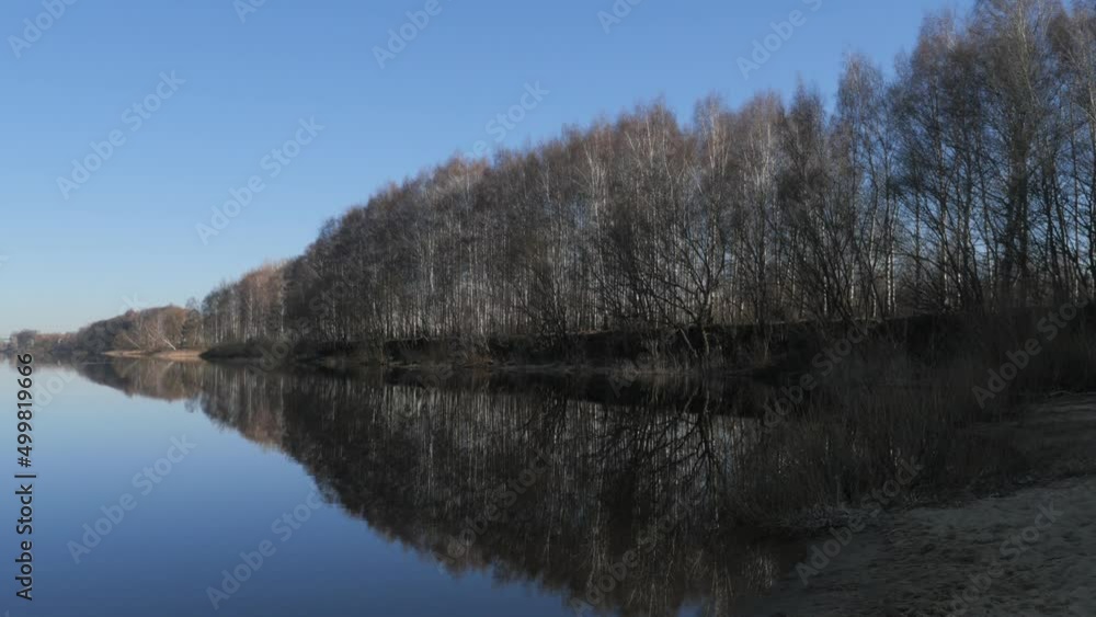Spring landscape. River and trees in the early morning. Nature background Spring landscape. River and trees in the early morning. Nature background