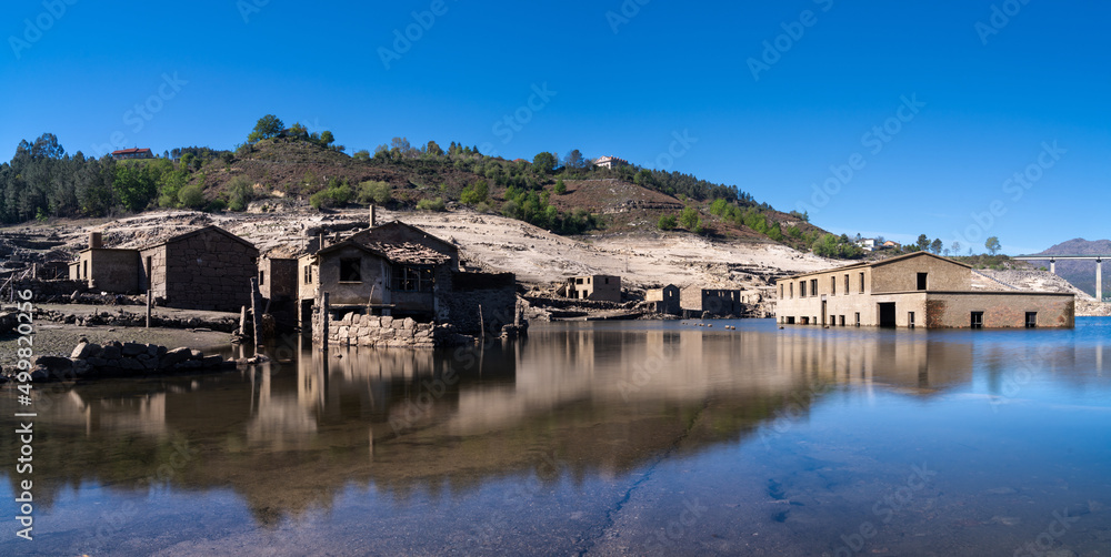 long exposure view of the ghost town of Aceredo in the Alto Lindoso reservoir