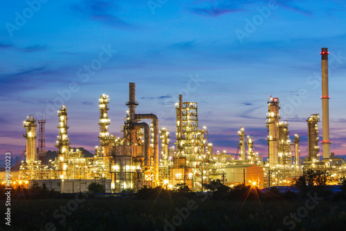 Oil​ refinery​ and​ plant and tower column of Petrochemistry industry in oil​ and​ gas​ ​industrial with​ cloud​ blue​ ​sky the morning