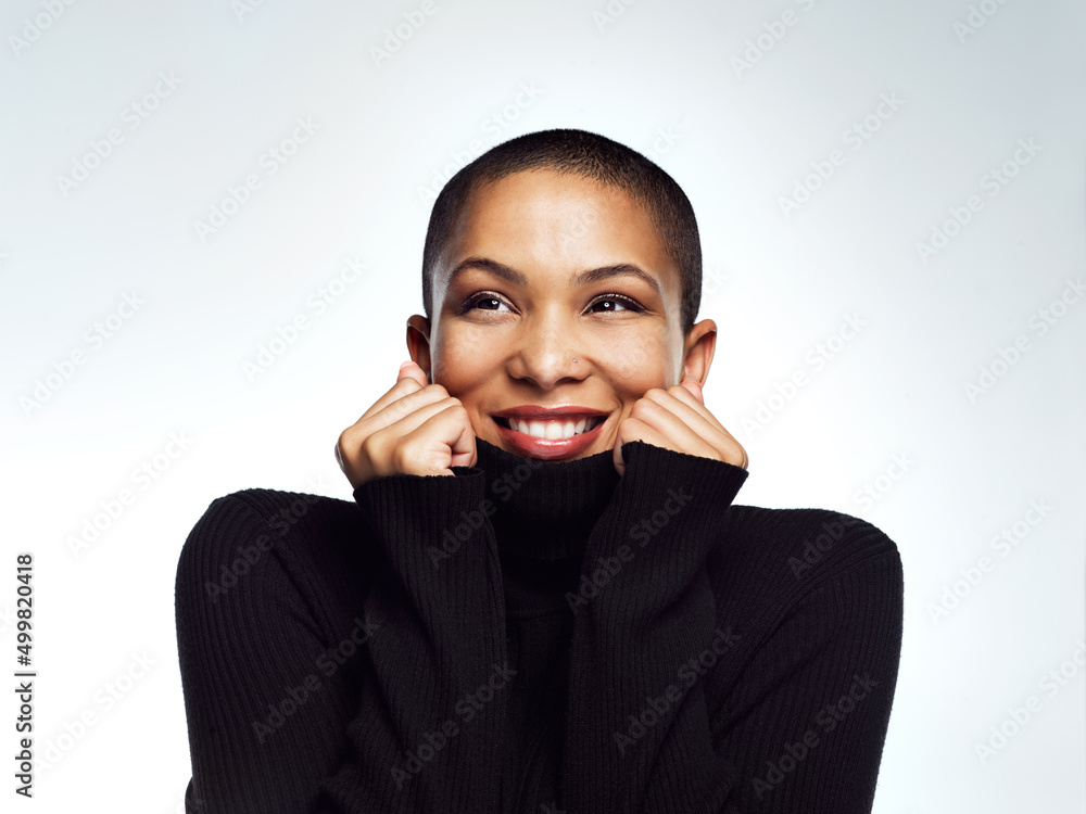 This feels so soft and comfy. Studio shot of a young woman posing against a grey background. This feels so soft and comfy. Studio shot of a young woman posing against a grey background.