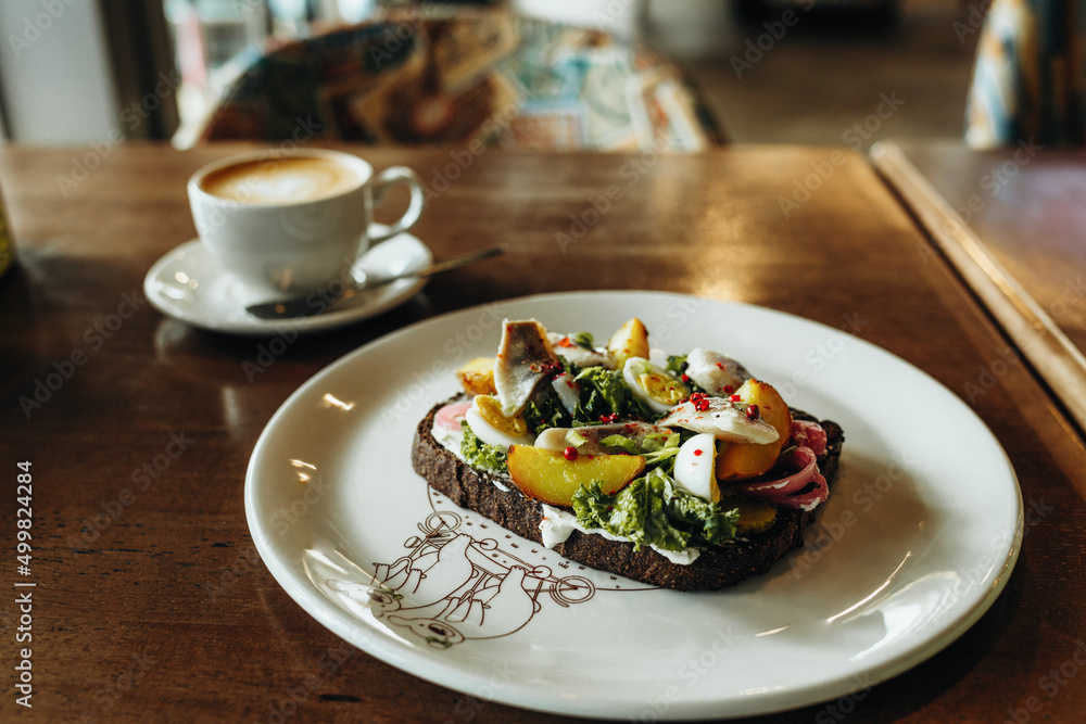 Bruschetta on a table in a cafe, healthy breakfast