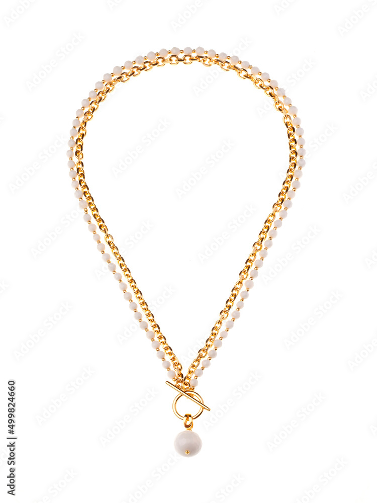 Female white round pendant with golden chain necklace isolated on white Female white round pendant with golden chain necklace isolated on white