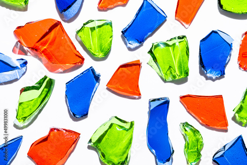 Colorful broken glass bottle on white background, Recycle and environment background, SDGs or ESG