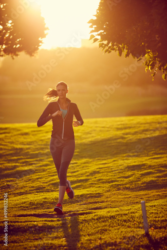 Shape up to a healthier you. Shot of a sporty young woman exercising outdoors.