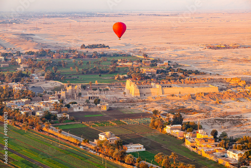 Hot air balloon flying above The Mortuary Temple of Ramesses III at Medinet Habu.