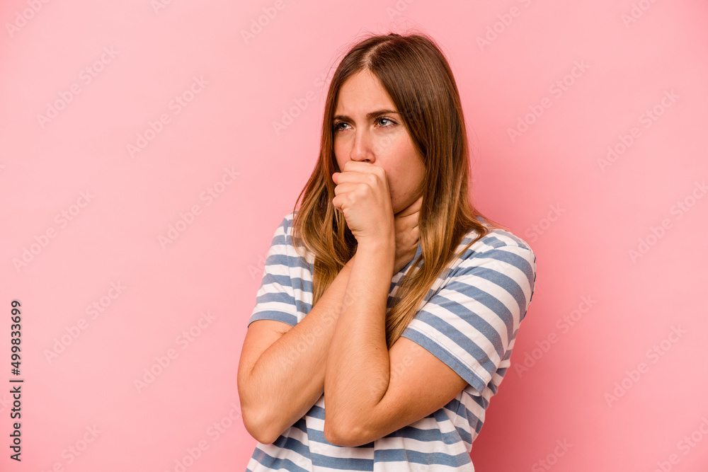 Young caucasian woman isolated on pink background suffers pain in throat due a virus or infection. Young caucasian woman isolated on pink background suffers pain in throat due a virus or infection.