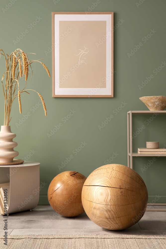 Stylish living room interior design with mock up poster frames, wooden ball  , coffe table, beige carpet and creative home accessories. Sage green wall.  Template. Stock Photo | Adobe Stock