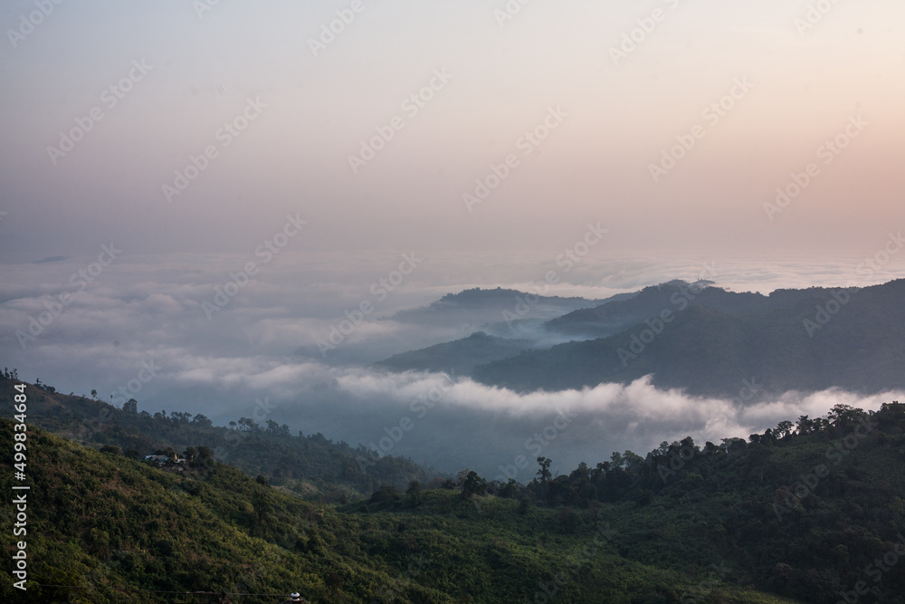 Morning fog over the mountain in Kyaiktiyo, Myanmar