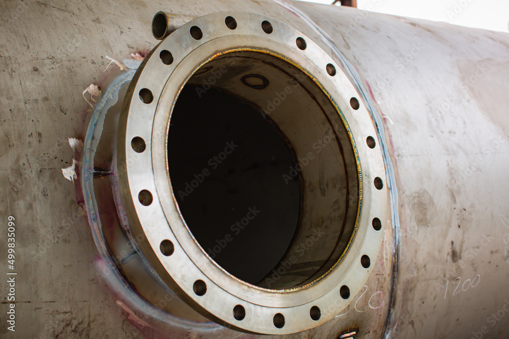 Manhole open lid stainless steel tank chemical methanol testing.