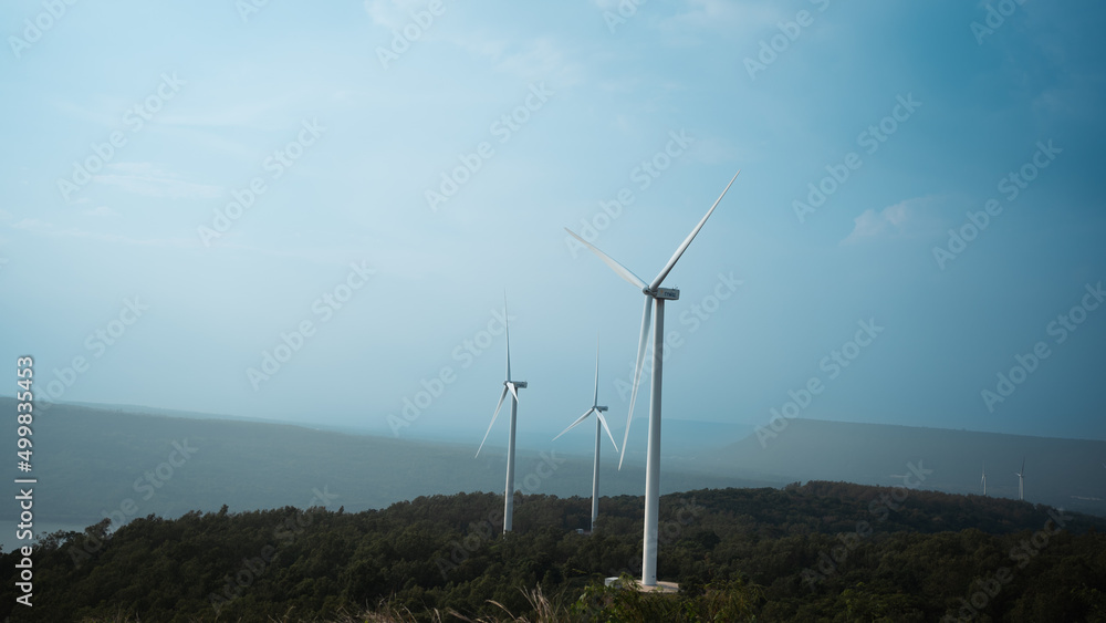 Wind turbine field Generating electricity from renewable energy, wind energy environment friendly.Reduce global warming, sustainability.
Clean Energy Reducing the use fossil fuels in power plant.