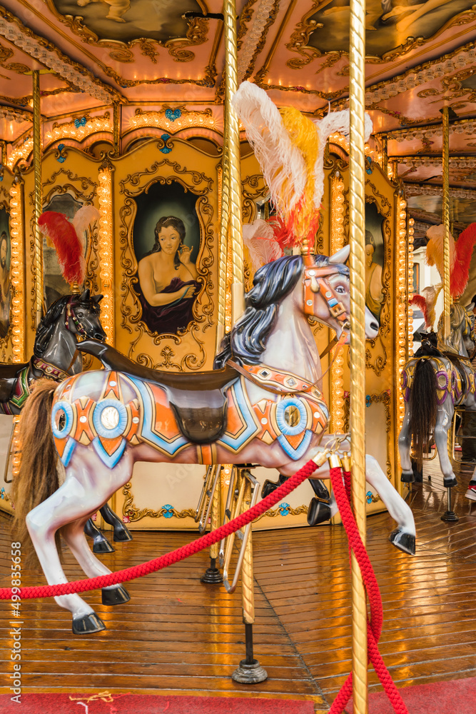 Close up - detail of an outdoor carousel in a square in Florence, Italy