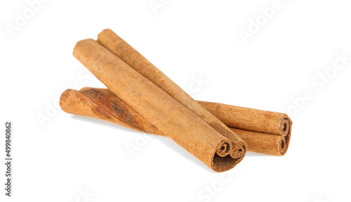 two cinnamon sticks isolated on white background
