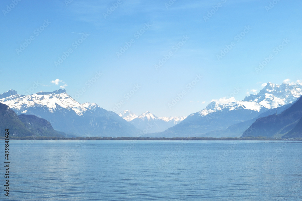 Geneva lake is famous place in Switzerland. Alp mountains with glacier. Beautiful outdoor landscape.