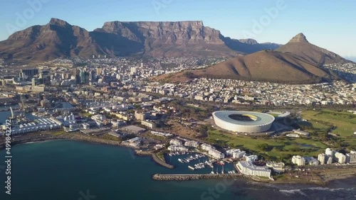  Aerial view over Cape Town, with Cape Town stadium and Table Mountain . photo