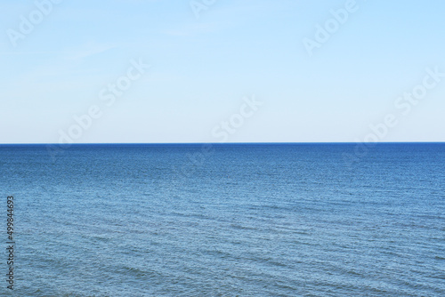calm sea, blue water and blue sky