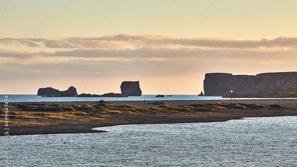 Fototapeta premium Iceland landscape black sand beach in Dyrholaey in twilight