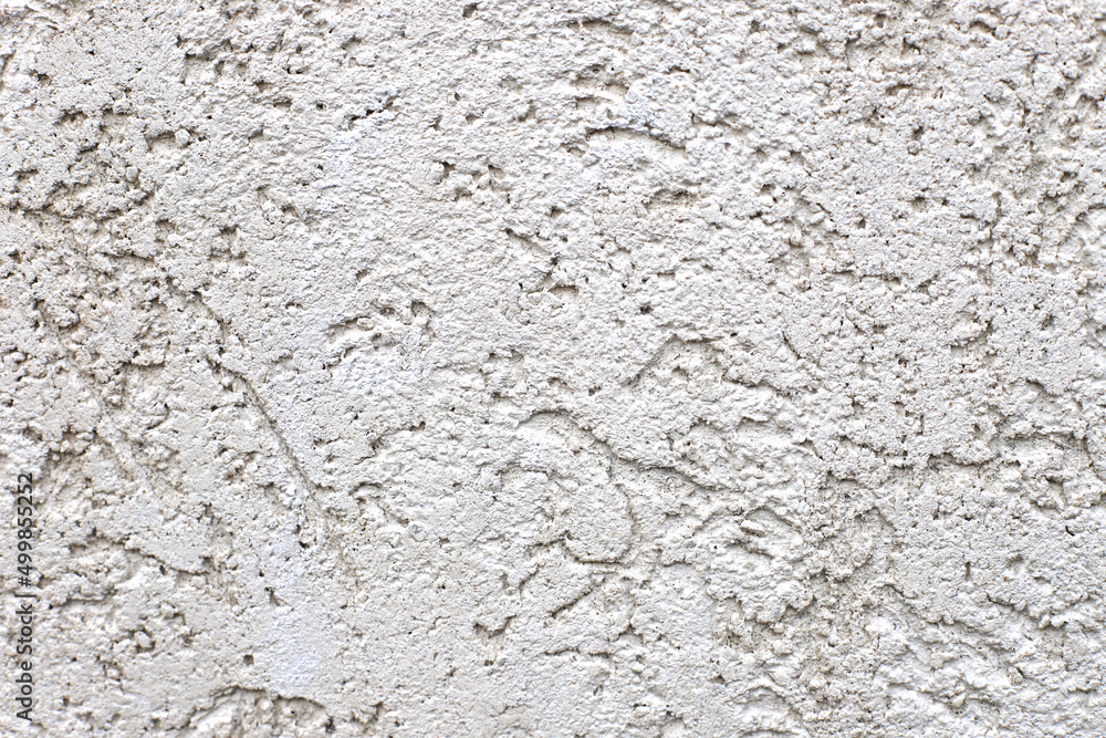 a white wall in the interior of the house. primer and paint. a white wall in the interior of the house. primer and paint.