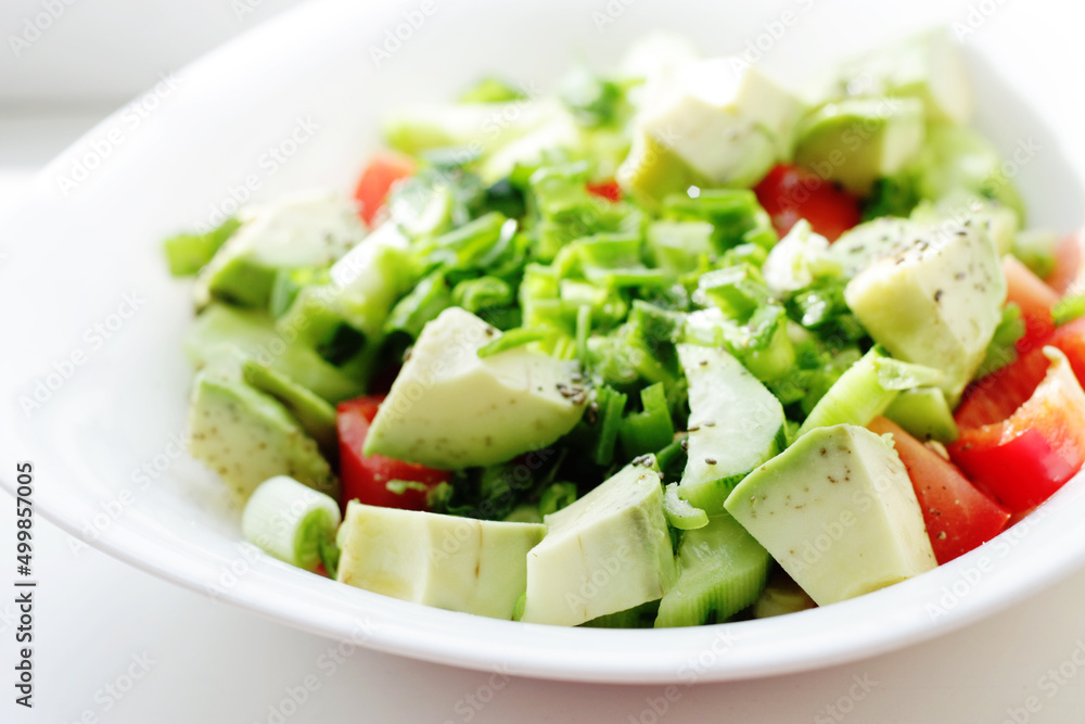 fresh salad with tomatoes and cucumbers and avocado fresh salad with tomatoes and cucumbers and avocado
