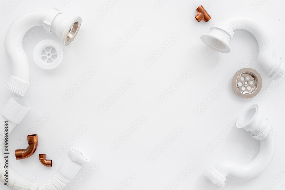Plumbing work equipment with pipes and fittings, top view