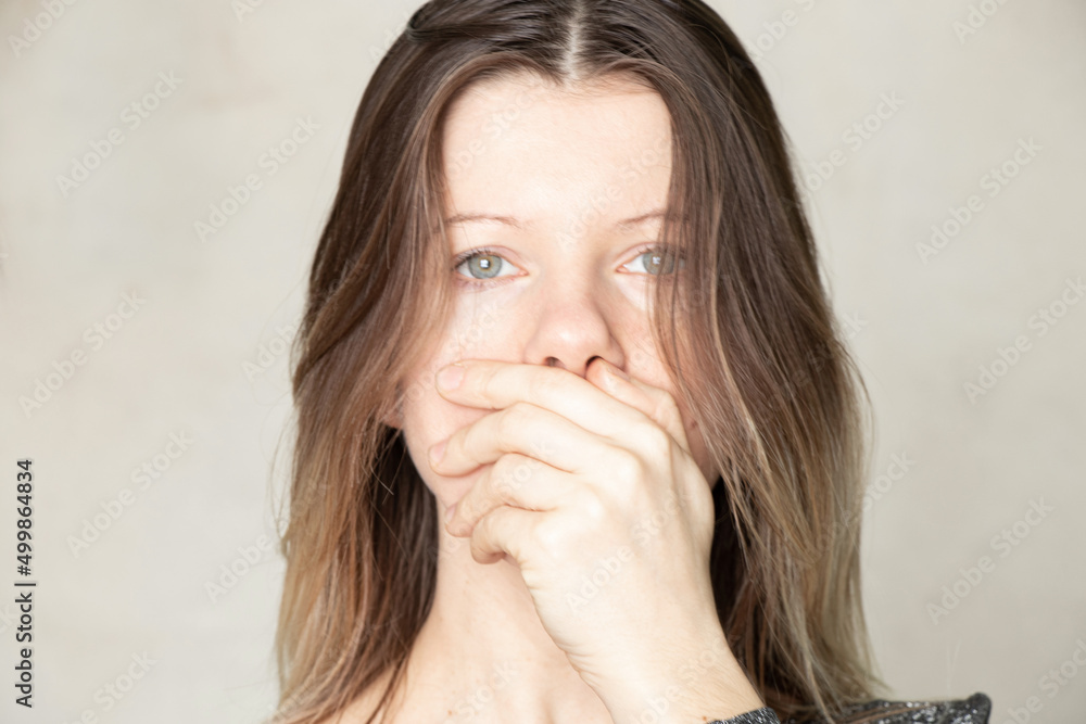 Girl with a closed mouth, forbid speaking, propaganda and silence, you can't speak the obvious in Russia Girl with a closed mouth, forbid speaking, propaganda and silence, you can't speak the obvious in Russia