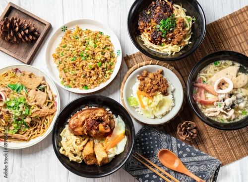 Assorted noodle soup, Pork Knuckle rice Bento, Chili Sauce Noodles, Shredded Pork Fried Rice, Dayang Chun Noodles Dry, Fried Pork Rice, in a dish isolated on wood table side view taiwan food