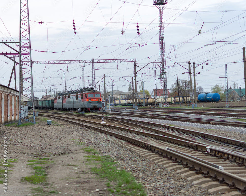 Railway tracks. Old railway, fresh green grass Railway tracks. Old railway, fresh green grass