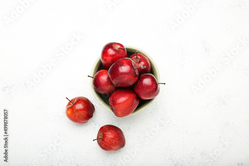 Fresh red apples. On a white stone background. Top view.