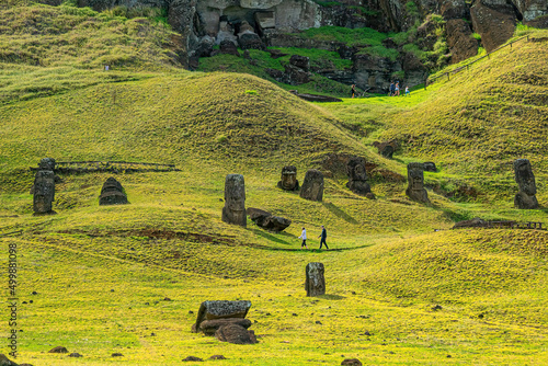 Moai set in the hillside at Rano Raraku photo
