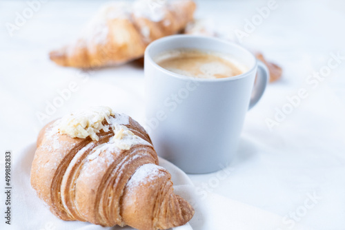 coffee and croissants on a white background