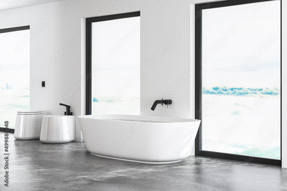 Beautiful white bathtub in centre of bright bathroom and toilet. Minimalist design of modern bathroom. 3D rendering Beautiful white bathtub in centre of bright bathroom and toilet. Minimalist design of modern bathroom. 3D rendering