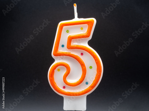A colorful big birthday candle for a cake